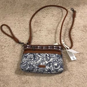 Brand new with tags on blue and brown detailed sakroots shoulder purse.
